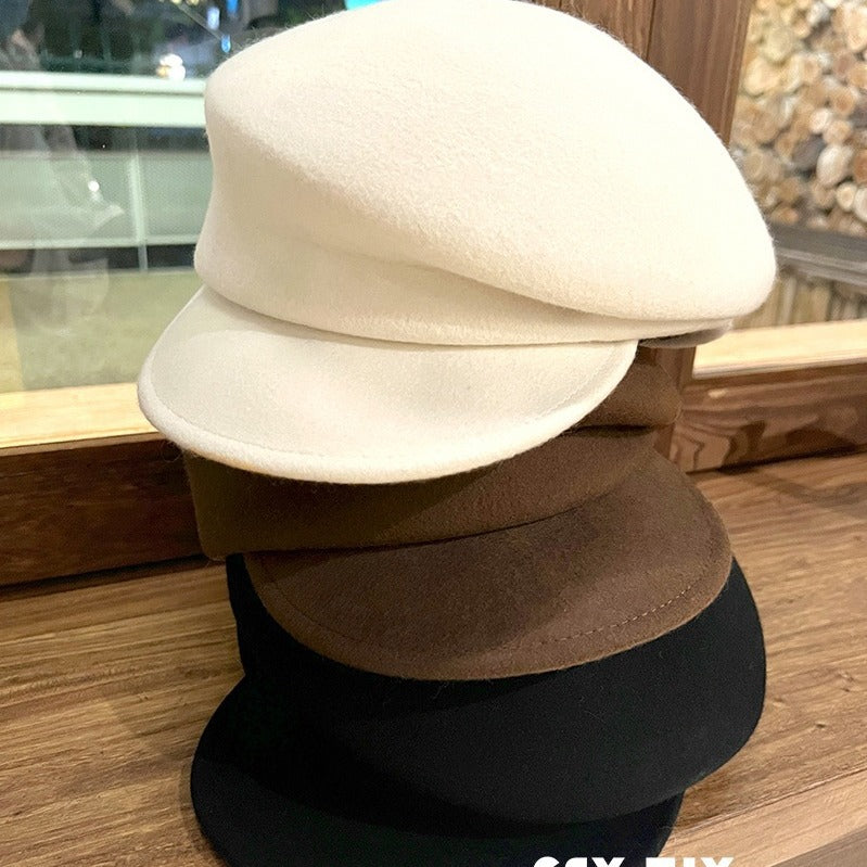 オーストラリアの100%ウールのベレー帽feverと同じ金の秋冬の黒の百合の騎士の帽子女性の新聞少年の帽子です