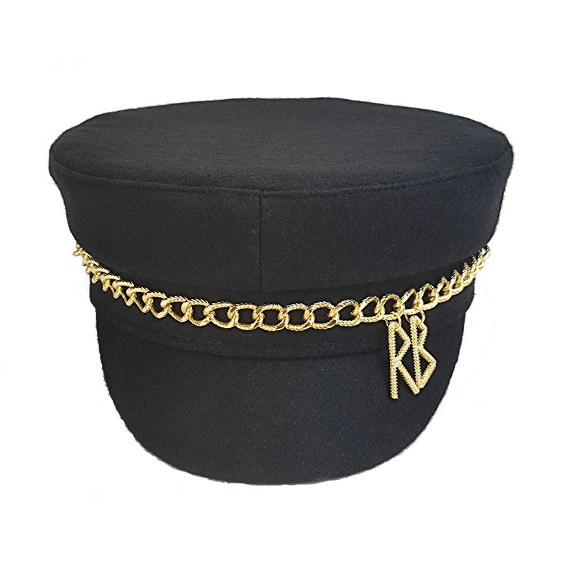 帽子の女性の秋冬の新型のファッションのチェーン海軍の帽子rbアルファベットの百合の帽子の屋外の暖かいアヒルの舌打ち帽です