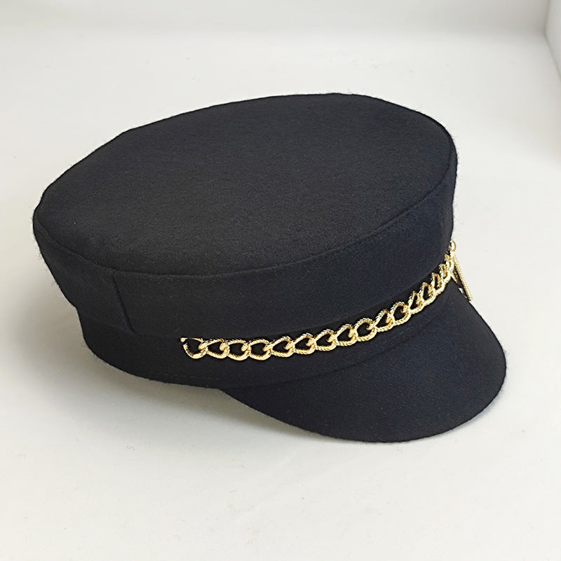 帽子の女性の秋冬の新型のファッションのチェーン海軍の帽子rbアルファベットの百合の帽子の屋外の暖かいアヒルの舌打ち帽です