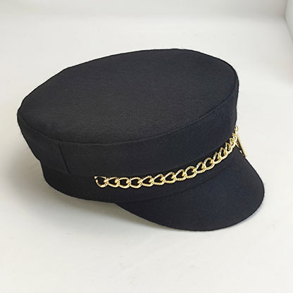帽子の女性の秋冬の新型のファッションのチェーン海軍の帽子rbアルファベットの百合の帽子の屋外の暖かいアヒルの舌打ち帽です