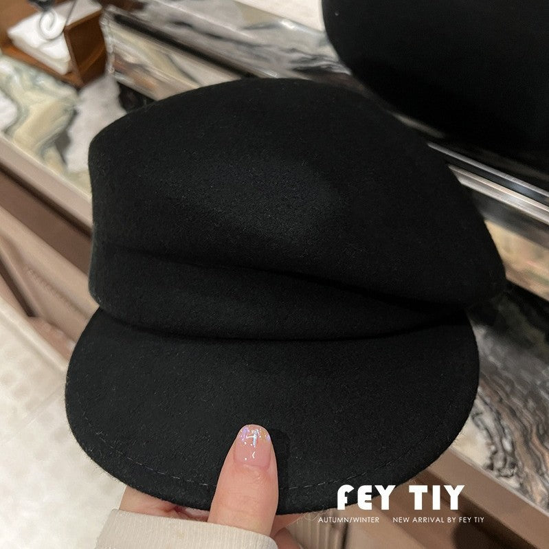 オーストラリアの100%ウールのベレー帽feverと同じ金の秋冬の黒の百合の騎士の帽子女性の新聞少年の帽子です