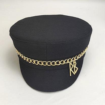 帽子の女性の秋冬の新型のファッションのチェーン海軍の帽子rbアルファベットの百合の帽子の屋外の暖かいアヒルの舌打ち帽です